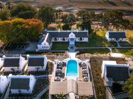 Grays Eden Boutique Hotel，位于马翁的带停车场的酒店