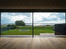Ocean view in first row. Architectural pearl，位于德拉厄的带按摩浴缸的酒店