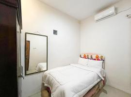 Oma Kost 3 Probolinggo Mitra RedDoorz，位于庞越的酒店