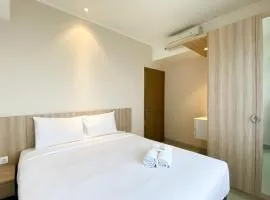 Cozy and Minimalist 2BR at 8th Floor The Oasis Cikarang Apartment By Travelio