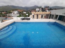 Suites Flora Deluxe Av 5，位于卡利的酒店
