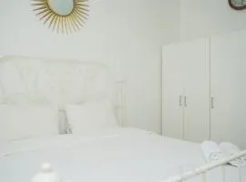 Strategic and Homey 2BR at Puri Garden Apartment near Mall By Travelio