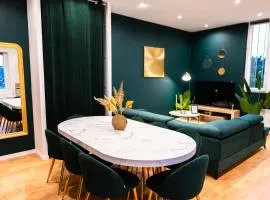 Grand loft familial 4 chambres avec parking privé