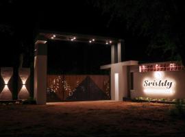 Srishty Garden Resorts，位于滕卡西的酒店