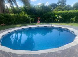 Melgar Alojamiento Villa Claudia，位于梅尔加的酒店