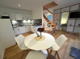 K14 FeWo - Am Kurpark - Therme，位于巴特萨罗皮斯库夫的带热水浴缸的酒店