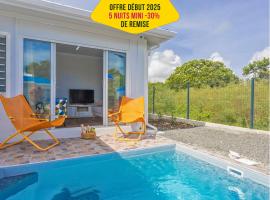 Domaine "Alizé Sainte-Marthe" - 3 Bungalows avec Piscine Privée - Idéal Couple & Famille - Clim - Mini Green de Golf - Wifi - Calme - 5min St-François Centre，位于圣弗朗索瓦的别墅