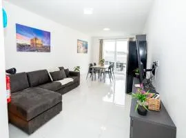 Spacious 2BR Apartment with Terrace - by HostMT