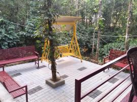 Pepper Mist Wayanad Homestay，位于Tindummal的酒店