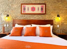 Hotel & Suites Cerro Roj0，位于Tlatlauquitepec的酒店