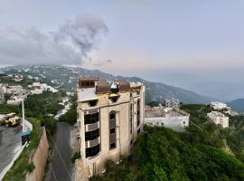 فندق إيوان جارة القمر للخدمات الفندقية，位于Fayfāʼ的酒店