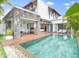 Luxury Villa - 2 minutes walk from the beach，位于格兰贝伊的酒店