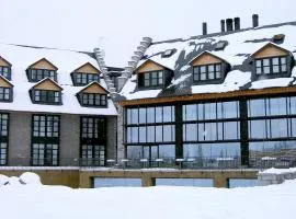 HG策尔勒公寓酒店