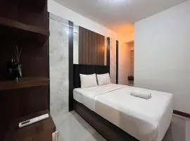 Warm and Cozy 2BR Vida View Makassar Apartment By Travelio