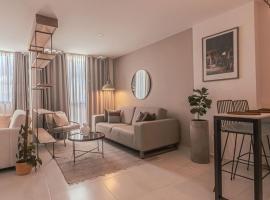 Torre de Apartasuites Centro Comercial Cerritos Mall，位于佩雷拉的酒店