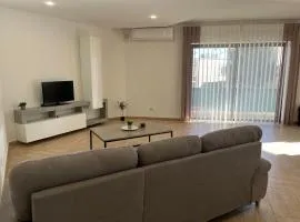 Free WiFi - 2 min walk to sea - Modern 2 BR Corner Ground Floor Apartment with large terrace balcony - Superb Location - Qawra