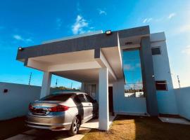 Sunset House - Casa de praia，位于阿拉卡茹的别墅