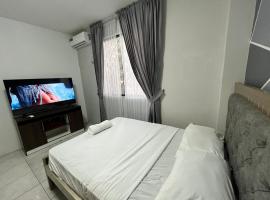 Enorme 3 habitaciones, 7 camas, centro de machala，位于马查拉的酒店