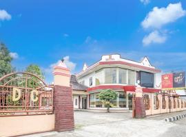 Capital O Hotel Dian Chandra，位于北加浪岸的酒店