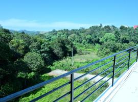 coorg misty mountains guest house，位于马迪凯里的住宿加早餐旅馆