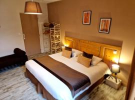 Chambres d'hôtes Une autre maison，位于Pupillin的带按摩浴缸的酒店