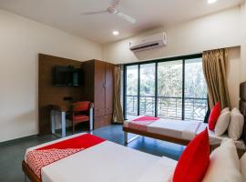 OYO Flagship Hotel Green-acre，位于锡尔瓦萨的酒店