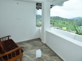 Sri Murugan Homestay Valparai，位于瓦尔帕莱的酒店