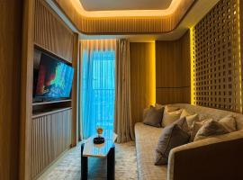 Apt Embarcadero 2BR with Netflix & Pool by Damaresa，位于Pondokpucung的酒店