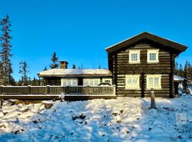 Large cozy log cabin with sauna and nice view in Sjusjøen，位于Ringsaker的酒店