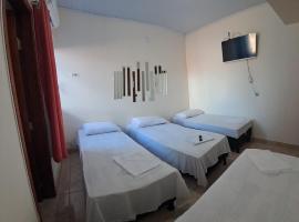 Hotel Pousada Mãe Rainha，位于特林达迪的酒店