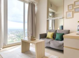Calma 1BR I at TreePark Apartment，位于Dadap的酒店
