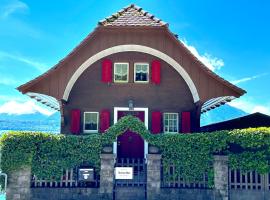 SwissHut Stunning Views Alps Lake - Chalet Monbijou，位于锡格里斯维尔的酒店
