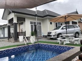 Homestay Tokmi Besut，位于Kampong Baru的酒店