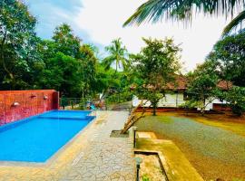 Blizzard Home Stay Wayanad，位于Padinjarathara的酒店