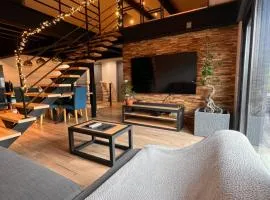 Loft industriel avec jacuzzi