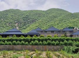 Nature Retreat Resort，位于布什格尔的酒店
