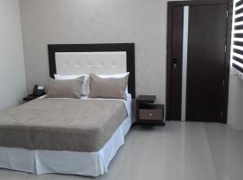 Palmar Center Mall & Hotel，位于El Guabo的酒店