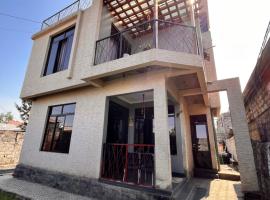 Au coin de la rue de Goma，位于戈马的带停车场的酒店