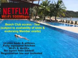 Beach condos at Pico de Loro Cove - Wi-Fi & Netflix, 42-50''TVs with Cignal cable, Uratex beds & pillows, equipped kitchen, balcony, parking - guest registration fee is not included