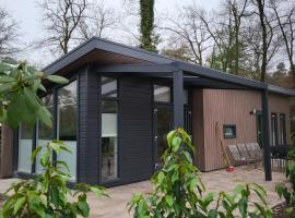 Knus Chalet met boszicht op Vakantiepark Bonte Vlucht - vlak bij Utrechtse Heuvelrug，位于多尔恩的酒店