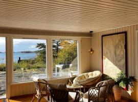 Delightful vacation home - boat - seaview - garden，位于格里姆斯塔的酒店