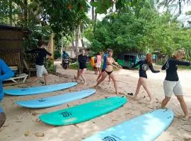 Surfing lion surfing school hirikatiya