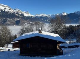Charmant petit chalet cosy，位于孔布卢的酒店