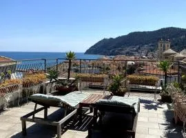 Attic with sea view and car box