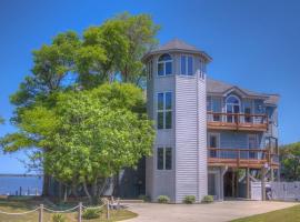 5550 Lighthouse Pointe Waterfront，位于斩魔山的酒店