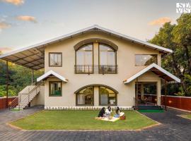 Areca Breeze by VEO - Part of StayVista with Pool，位于Nāgaonkhar的酒店