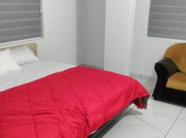 Little home apartment，位于科泽科德的酒店