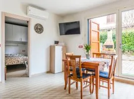 Piano Terra Moderno con Ampi Spazi e Luminosità