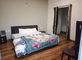 Nainigreen Valley Kainchidham Luxurious Homestay，位于奈尼塔尔的酒店