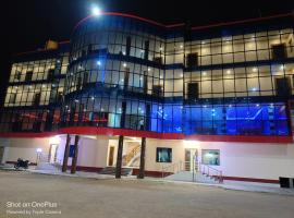 whirlwind food court and resort，位于Numāligarh的酒店